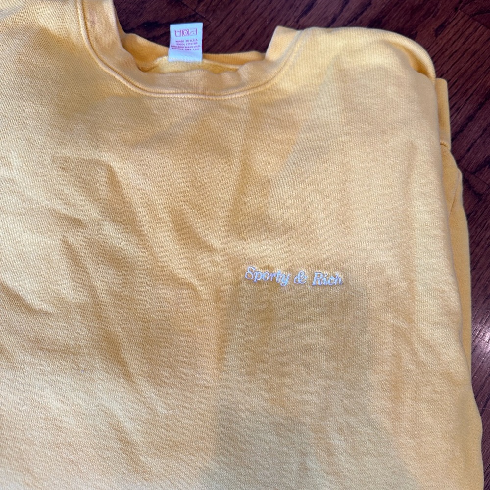 Sporty and Rich yellow sweatshirt